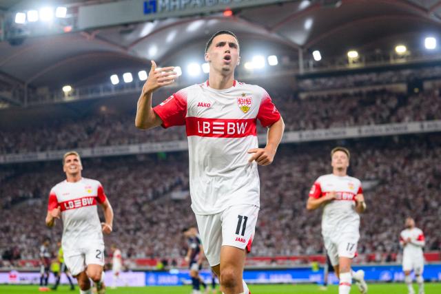 04 September 2026, Baden-Wuerttemberg, Stuttgart: Stuttgart's Bilal El Khannouss (C) celebrates scoring his side's opening goal during the German Bundesliga soccer match between VfB Stuttgart and 1. FC Koeln, at MHPArena. Photo: Tom Weller/dpa - IMPORTANT NOTICE: In accordance with the regulations of the Bundesliga and the DFB (German Football Association), it is prohibited to use or allow the use of photographs taken in the stadium and/or during the game in the form of sequential images and/or video-like photo series.