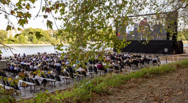 FILED - 24 August 2022, Rhineland-Palatinate, Ludwigshafen: FILE PHOTO - Festivalgoers watch a movie at the German Film Festival's outdoor cinema. Photo: Joachim Ackermann/dpa