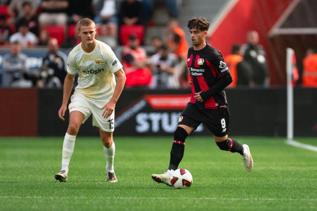05 September 2026, North Rhine-Westphalia, Leverkusen: Leverkusen's Afonso Moreira (R) and and Union Berlin's Tom Rothe battle for the ball during the German Bundesliga, soccer match between Bayer Leverkusen and 1. FC union Berlin at the BayArena. Photo: Marius Becker/dpa - IMPORTANT NOTE: In accordance with the regulations of the Bundesliga and the DFB (German Football Association), it is prohibited to use or allow the use of photographs taken in the stadium and/or during the game in the form of sequential images and/or video-like photo series.