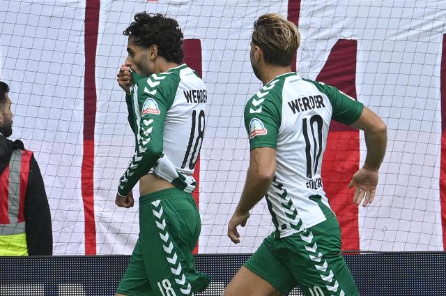 05 September 2026, Bremen: Werder Bremen's Eren Dinkci (L) celebrates scoring his side's first goal with teammate Niclas Fuellkrug during the German Bundesliga soccer match between Werder Bremen and RB Leipzig at the Weserstadion. Photo: Carmen Jaspersen/dpa - IMPORTANT NOTICE: Bundesliga and DFB regulations prohibit any use of photographs as image sequences and/or quasi-video.
