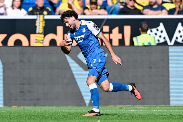05 September 2026, Baden-Württemberg, Sinsheim: Hoffenheim's Leon Avdullahu celebrates scoring his side's first goal during the German Bundesliga soccer match between TSG 1899 Hoffenheim and Borussia Dortmund at the SNP Arena. Photo: Uwe Anspach/dpa - IMPORTANT NOTICE: Bundesliga and DFB regulations prohibit any use of photographs as image sequences and/or quasi-video.