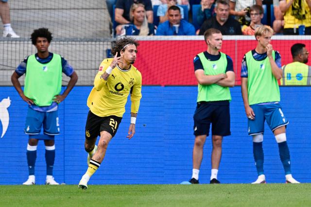 05 September 2026, Baden-Württemberg, Sinsheim: Dortmund's Fabio Silva celebrates scoring his side's second goal during the German Bundesliga soccer match between TSG 1899 Hoffenheim and Borussia Dortmund at the SNP Arena. Photo: Uwe Anspach/dpa - IMPORTANT NOTICE: Bundesliga and DFB regulations prohibit any use of photographs as image sequences and/or quasi-video.