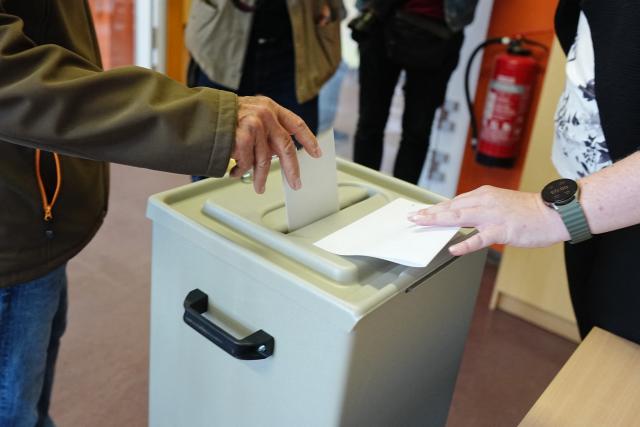 06 September 2026, Saxony-Anhalt, Tangermünde: A voter sits in a voting booth and casts a ballot. Saxony-Anhalt elects a new state parliament on Sunday. Photo: Kay Nietfeld/dpa