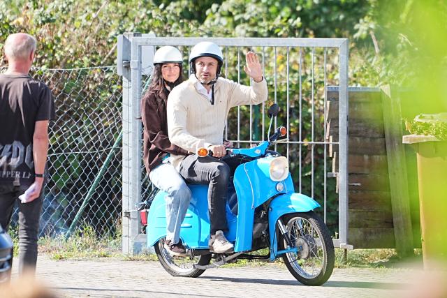 06 September 2026, Saxony-Anhalt, Tangermünde: Ulrich Siegmund, the party's lead candidate and co-chair of the AfD parliamentary group in the Saxony-Anhalt state parliament, arrives at a polling station on a Simson Schwalbe motorcycle with his wife, Julia Siegmund, to cast his vote. Saxony-Anhalt elects a new state parliament on Sunday. Photo: Michael Kappeler/dpa