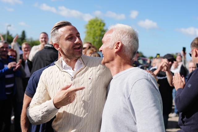 06 September 2026, Saxony-Anhalt, Tangermünde: Ulrich Siegmund (L), the party's top candidate and co-chair of the AfD parliamentary group in Saxony-Anhalt, greets a man outside a polling station before casting his vote. Saxony-Anhalt elects a new state parliament on Sunday. Photo: Kay Nietfeld/dpa