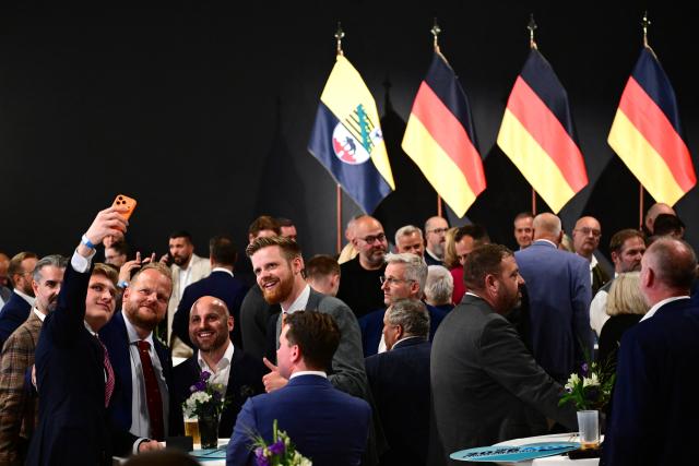 06 September 2026, Saxony-Anhalt, Magdeburg: Alternative for Germany (AfD) supporters await the projections for the results of the Saxony-Anhalt state election at the AfD's election party at the Altes Theater. Photo: Sebastian Gollnow/dpa