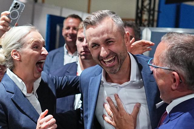 06 September 2026, Saxony-Anhalt, Magdeburg: Ulrich Siegmund (C), Alternative for Germany (AfD) top candidate and co-chair of the state parliamentary group in Saxony-Anhalt, celebrates with federal chairmen and chair of the AfD parliamentary group in the Bundestag Alice Weidel (L) and Tino Chrupalla following the projection of the results of the Saxony-Anhalt state election. Photo: Michael Kappeler/dpa