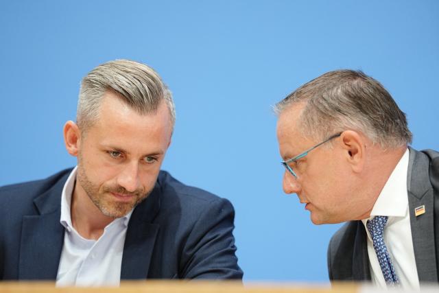 07 September 2026, Berlin: Ulrich Siegmund (L), the AfD's top candidate in the Saxony-Anhalt state election, and Tino Chrupalla, federal chairman and parliamentary group leader of the AfD, talk at the Federal Press Conference on the results of the state election in Saxony-Anhalt. Photo: Kay Nietfeld/dpa