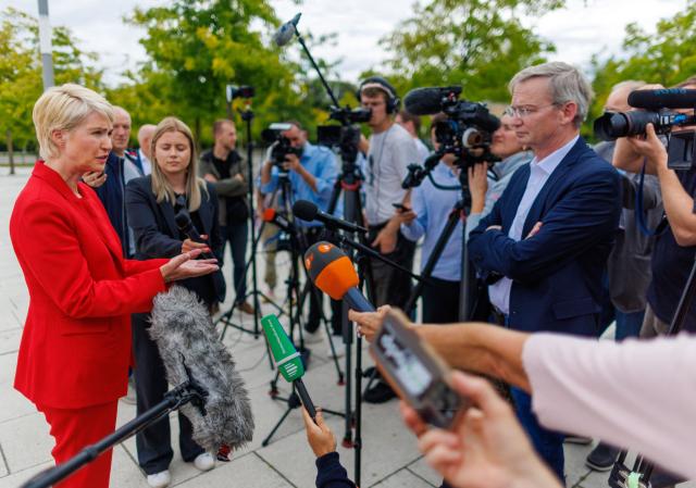 07 September 2026, Mecklenburg-Western Pomerania, Schwerin: Manuela Schwesig, the Minister-President of Mecklenburg-Western Pomerania and the Social Democratic Party of Germany (SPD) top candidate for the state election, answers questions from media representatives about the election results in Saxony-Anhalt in front of Schwerin Palace. On September 20, 2026, a new state parliament will be elected in Mecklenburg-Western Pomerania. Photo: Jens Büttner/dpa