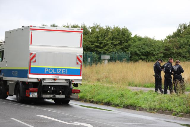 08 September 2026, North Rhine-Westphalia, Eschweiler: German Police officers are stationed near the Weisweiler power plant. Since Monday afternoon, a large number of police officers have been deployed around the power plant and have been conducting an intensive search for the suspect, who is believed to have carried out several acts of sabotage against the German power grid. Photo: Sascha Thelen/dpa