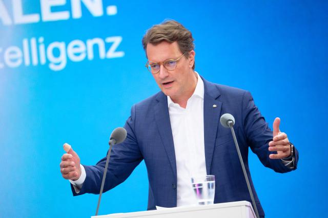 08 September 2026, North Rhine-Westphalia, Cologne: Hendrik Wuest, Minister President of North Rhine-Westphalia, speaks at Deutsche Telekom's Digital X trade show. Photo: Henning Kaiser/dpa