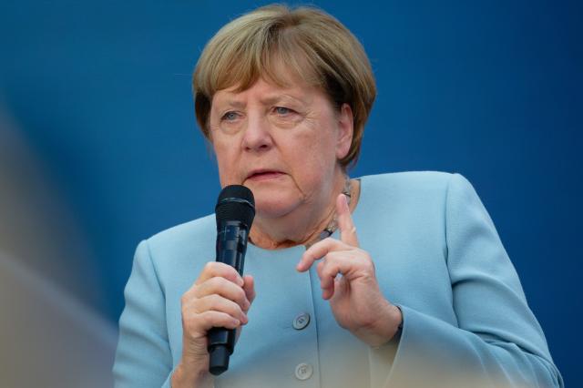 08 September 2026, North Rhine-Westphalia, Cologne: Germany's former Chancellor Angela Merkel speaks at Deutsche Telekom's Digital X trade show. Photo: Henning Kaiser/dpa