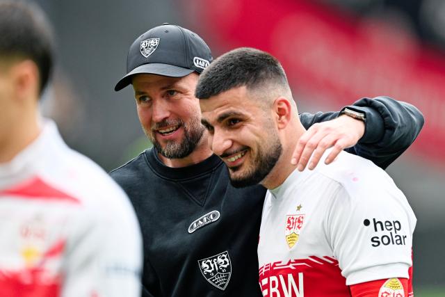 FILED - 16 May 2026, Hesse, Frankfurt_Main: FILE PHOTO - Stuttgart coach Sebastian Hoeness (L) celebrates with Stuttgart's Deniz Undav after the German Bundesliga soccer match between Eintracht Frankfurt and vfB Stuttgart at the Deutsche Bank Park. Photo: Uwe Anspach/dpa