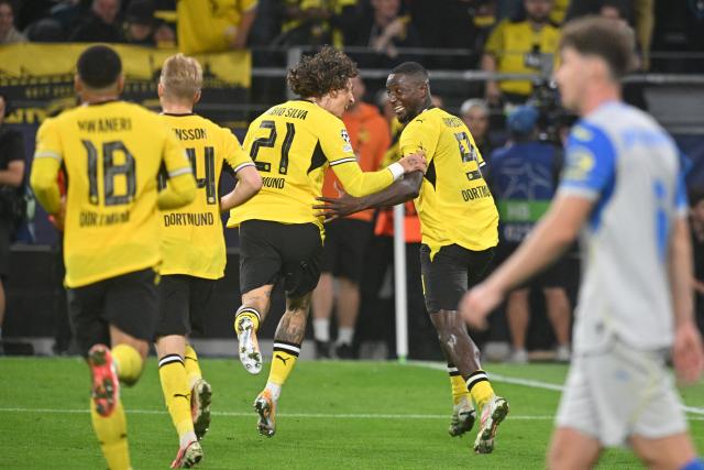 08 September 2026, North Rhine-Westphalia, Dortmund: Borussia Dortmund Serhou Guirassy (R) celebrates scoring his side's second goal with teammate Fabio Silva during the UEFA Champions League group stage soccer match between Borussia Dortmund and Villarreal CF at Signal Iduna Park. Photo: Bernd Thissen/dpa