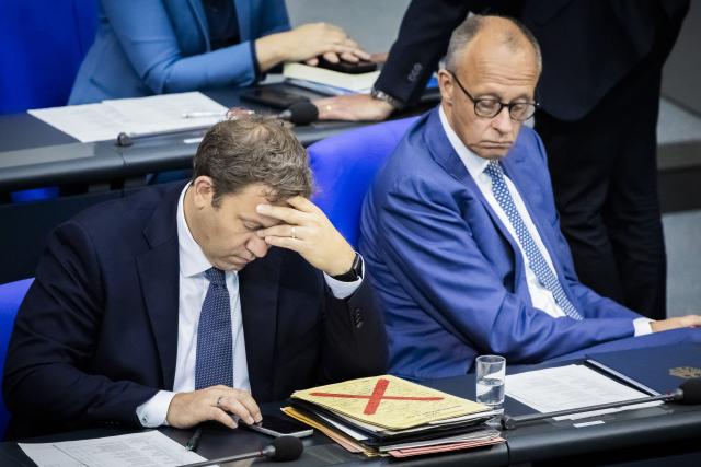 09 September 2026, Berlin: Germany's Chancellor Friedrich Merz (R) and Lars Klingbeil, Germany's Minister of Finance and co-chair of the Social Democratic Party (SPD), attend the general debate during budget deliberations in the German Bundestag. Photo: Christoph Soeder/dpa
