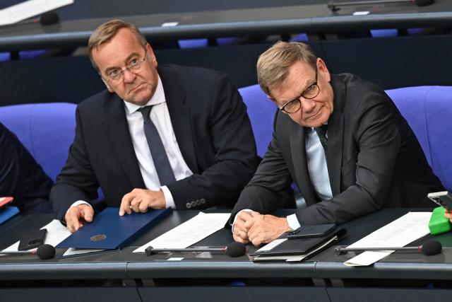 09 September 2026, Berlin: German Minister of Foreign Affairs Johann Wadephul (R) and Minister of Defense Boris Pistorius attend the general debate on the budget in the German Parliament (Bundestag). Photo: Michael Brandt/dpa