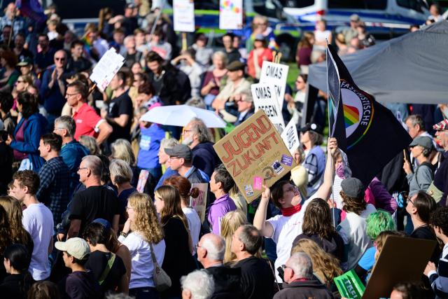 09 September 2026, Lower Saxony, Bleckede: People gather at a rally against an Alternative for Germany (AfD) campaign event. Photo: Philipp Schulze/dpa