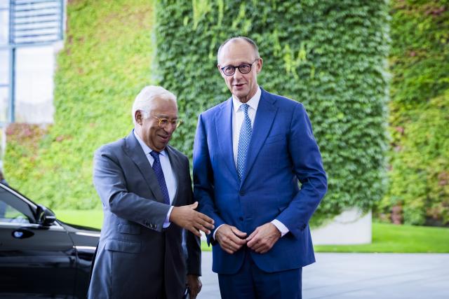 09 September 2026, Berlin: Antonio Costa (L), President of the European Council, is welcomed by German Chancellor Friedrich Merz in the courtyard of honor in front of the German Chancellery. Photo: Christoph Soeder/dpa