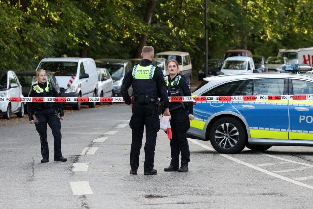 09 September 2026, Hamburg: Police cordoned off Ploener Strasse in Hamburg-Altona with caution tape, where a World War II-era bomb has been discovered along a major railroad line in northwest Hamburg. Photo: Bodo Marks/dpa