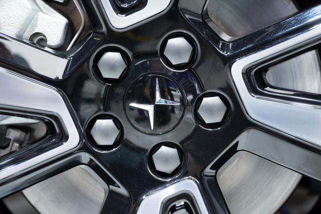 FILED - 10 September 2021, Bavaria, Munich: FILE PHOTO - The Polestar logo can be seen on a rim during the International Motor Show (IAA Mobility). Photo: Sven Hoppe/dpa