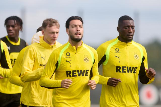 10 September 2026, North Rhine-Westphalia, Dortmund: (L-R) Borussia Dortmund's Joane Gadou, Borussia Dortmund's Maximilian Beier, Borussia Dortmund's Ramy Bensebaieni, and Borussia Dortmund's Serhou Guirassy take part in the public training session. Photo: Bernd Thissen/dpa