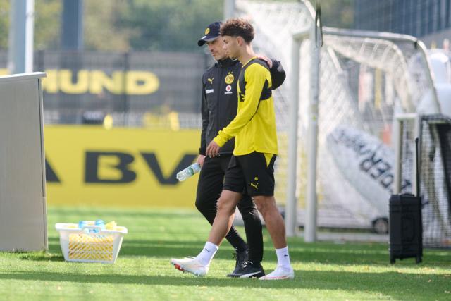 10 September 2026, North Rhine-Westphalia, Dortmund: Borussia Dortmund Coach Niko Kovac walks across the field with Samuele Inacio during an open training session. Photo: Bernd Thissen/dpa