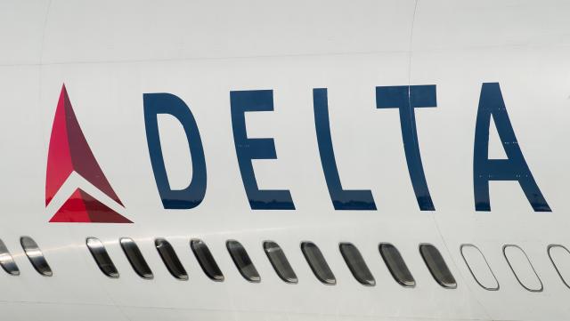 FILED - 12 September 2018, Frankfurt/Main: FILE PHOTO - The Delta logo is pictured on a passenger aircraft of the Delta Airlines on the apron of Frankfurt airport. Photo: Silas Stein/dpa