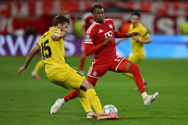 10 September 2026, Bavaria, Munich: Bayern Munich's Michael Olise (R) and Bodo/Glimt's Fredrik Bjoerkan battle for the ball during the UEFA Champions League group stage soccer match between Bayern Munich and FK Bodo/Glimt at Allianz Arena. Photo: Sven Hoppe/dpa