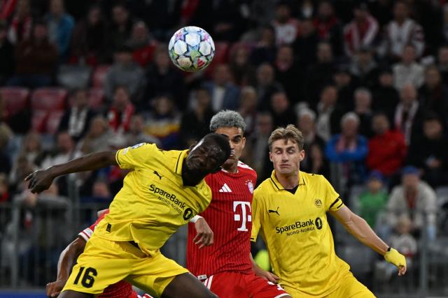 10 September 2026, Bavaria, Munich: Bodo/Glimt's Joshua Kitolano (L) and Fredrik Sjoevold (R) battle for the ball with Bayern Munich's Luis Diaz during the UEFA Champions League group stage soccer match between Bayern Munich and FK Bodo/Glimt at Allianz Arena. Photo: Sven Hoppe/dpa