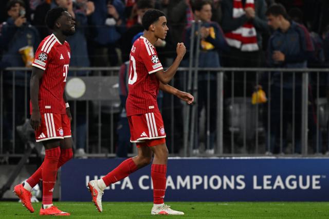 10 September 2026, Bavaria, Munich: Bayern Munich's Jamal Musiala (R) celebrates scoring his side's first goal with teammate Alphonso Davies during the UEFA Champions League group stage soccer match between Bayern Munich and FK Bodo/Glimt at Allianz Arena. Photo: Sven Hoppe/dpa