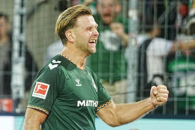 12 September 2026, North Rhine-Westphalia, Cologne: Werder Bremen's Niclas Fuellkrug celebrates scoring his side's first goal during the German Bundesliga soccer match between 1. FC Cologne and Werder Bremen at RheinEnergieStadion. Photo: Thomas Frey/dpa - WICHTIGER HINWEIS: Gemäß den Vorgaben der Bundesliga bzw. des DFB Deutscher Fußball-Bund ist es untersagt, in dem Stadion und/oder vom Spiel angefertigte Fotoaufnahmen in Form von Sequenzbildern und/oder videoähnlichen Fotostrecken zu verwerten bzw. verwerten zu lassen.