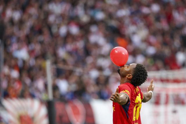 13 September 2026, Saxony, Leipzig: Leipzig's Christopher Nkunku celebrates scoring his side's fourth goal during the German Bundesliga soccer match between RB Leipzig and Hamburger SV at Red Bull Arena. Photo: Jan Woitas/dpa - IMPORTANT NOTICE: In accordance with the regulations of the Bundesliga and the DFB (German Football Association), it is prohibited to use or allow the use of photographs taken in the stadium and/or during the game in the form of sequential images and/or video-like photo sequences.