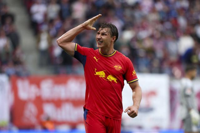 13 September 2026, Saxony, Leipzig: Leipzig's Willi Orban celebrates scoring his side's third goal during the German Bundesliga soccer match between RB Leipzig and Hamburger SV at Red Bull Arena. Photo: Jan Woitas/dpa - IMPORTANT NOTICE: In accordance with the regulations of the Bundesliga and the DFB (German Football Association), it is prohibited to use or allow the use of photographs taken in the stadium and/or during the game in the form of sequential images and/or video-like photo sequences.