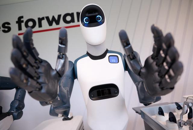 14 September 2026, Bavaria, Munich: The humanoid robot "Agile ONE" is on display at a press event at Agile Robots' headquarters. Photo: Sven Hoppe/dpa