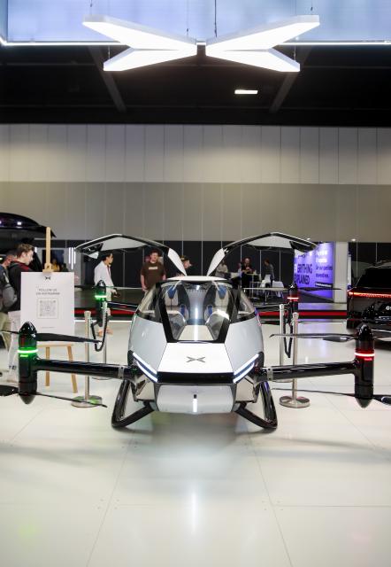 (241108) -- SYDNEY, Nov. 8, 2024 (Xinhua) -- This photo shows a XPENG flying car presented during the Sydney International EV AutoShow 2024 in Sydney, Australia, Nov. 8, 2024. The three-day event kicked off at the International Convention & Exhibition Center in Sydney on Friday, showcasing electric vehicles from global manufacturers. (Xinhua/Ma Ping)