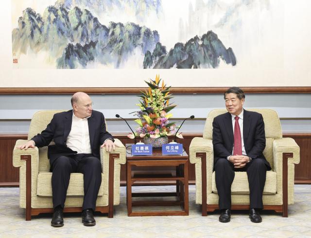 (241114) -- BEIJING, Nov. 14, 2024 (Xinhua) -- Chinese Vice Premier He Lifeng, also a member of the Political Bureau of the Communist Party of China Central Committee, meets with HSBC Group Chairman Mark Tucker in Beijing, capital of China, Nov. 14, 2024. (Xinhua/Pang Xinglei)