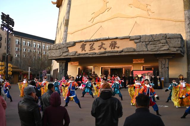 (241126) -- YINCHUAN, Nov. 26, 2024 (Xinhua) -- A performance is staged at an immersive performing arts town in Xixia District of Yinchuan, northwest China's Ningxia Hui Autonomous Region, Nov. 25, 2024.
  The immersive performing arts town, also called Manpu Town, is a tourism resort attracting people with its unique Helan Mountain culture. (Xinhua/Mao Zhu)