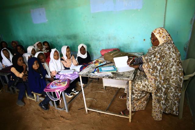 (241126) -- OMDURMAN, Nov. 26, 2024 (Xinhua) -- Children attend a class at a school in Al-Iskan, north of Omdurman, Sudan, on Nov. 25, 2024. More than 15 million children in Sudan are out of school due to the country's ongoing conflict. In relatively safe areas of Omdurman, some schools resumed classes on Monday. (Photo by Mohamed Khidir/Xinhua)