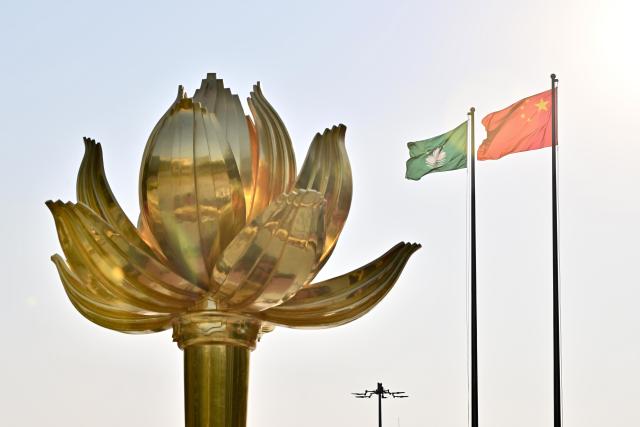 (241229) -- BEIJING, Dec. 29, 2024 (Xinhua) -- A flag-raising ceremony marking the 25th anniversary of Macao's return to the motherland is held at the Golden Lotus Square in Macao, south China, Dec. 20, 2024.
  Top 10 China news events of 2024
  10. Celebration of the 25th anniversary of Macao's return to the motherland
  Dec. 20 marked the 25th anniversary of Macao's return to the motherland. A meeting to celebrate the anniversary and the inaugural ceremony of the sixth-term government of the Macao Special Administrative Region (SAR) was held on the day. President Xi Jinping, also general secretary of the CPC Central Committee and chairman of the Central Military Commission, attended the meeting and delivered an important speech.
  Over the past 25 years since Macao's return, enormous success has been achieved in advancing the cause of "one country, two systems" with distinctive Macao features. Macao has undergone a fundamental transformation and its international standing has risen significantly.
  The great achievements of Macao since its return to the motherland have proven that the "one country, two systems," with its distinctive institutional strengths and strong vitality, is a good system that sustains the long-term prosperity and stability of Hong Kong and Macao.
  It is also a good system that facilitates endeavors to build China into a great country and achieve national rejuvenation, and a good system for ensuring peaceful coexistence and mutual benefit between different social systems, which must be upheld in the long run. (Xinhua/Zhu Wei)