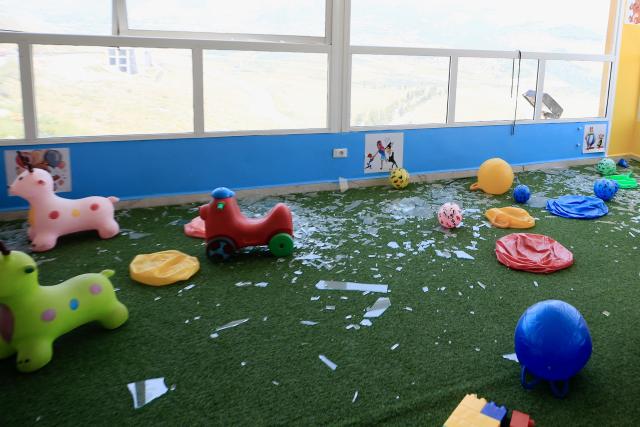 (250509) -- NABATIEH, May 9, 2025 (Xinhua) -- This photo taken on May 8, 2025 shows broken windows in a building after an Israeli airstrike in Kfar Tebnit, Upper Nabatieh, Lebanon. Israeli warplanes carried out a series of intense airstrikes on Thursday on the outskirts of the city of Nabatieh in southern Lebanon, according to official and security sources.
  Israeli warplanes conducted two waves of violent strikes targeting valleys, highlands, and wooded areas between the village of Kfar Tebnit, Upper Nabatieh, and the city of Kfar Remen, said the official Lebanese National News Agency (NNA). (Photo by Ali Hashisho/Xinhua)