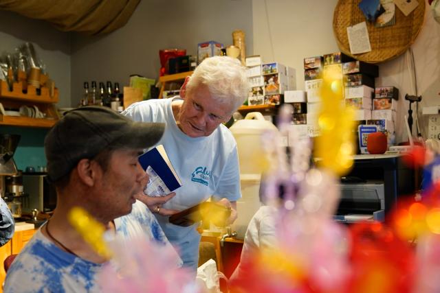 (250509) -- CHENGDU, May 9, 2025 (Xinhua) -- Rachel Grace Pinniger (R) talks with a staff member at the handicrafts shop Blue Sheep in Chengdu, southwest China's Sichuan Province, April 19, 2025.
  All eyes were on the beloved Rachel Grace Pinniger, nicknamed "Grandma Rachel," at a farewell event held in front of Blue Sheep in April. 
  Rachel, 79, a native to England, has traversed conflict zones and disaster-hit areas after graduation from medical school to pursue a career of medical, healthcare and education services in more than a dozen of developing countries across Asia and Africa.
  Rachel rushed to Sichuan in 2008, and devoted herself wholeheartedly to the Wenchuan earthquake relief efforts, and kept thinking how she could help more. In 2013, Rachel moved to Chengdu and founded the handicrafts shop Blue Sheep, named after the Himalayan mountain goats that thrive in the plateau's harsh natural environment. 
   The shop deals handicrafts made by disabled artisans and struggling families. Over the past decade, the shop has supported more than 1,000 disadvantaged individuals in Sichuan.
  Before her 80th birthday, Rachel decided to leave Chengdu and return to her hometown with precious memories. At the farewell event held by Blue Sheep's staff and volunteers, she said she would continue to care for those in need, and encourage the loving ones to keep their support for Blue Sheep and the artisans who craft hope with their deft fingers and steadfast minds. (Xinhua/Xu Bingjie)