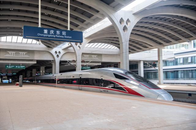 (250509) -- CHONGQING, May 9, 2025 (Xinhua) -- The high-speed test train departs from Chongqing East Railway Station in southwest China's Chongqing Municipality, May 9, 2025. With the departure of the high-speed test train from Chongqing East Railway Station, the joint debugging and test of Chongqing section of the newly-built Chongqing-Xiamen high-speed railway were successfully completed and started its test operation on Friday. (Xinhua/Tang Yi)