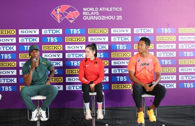 (250509) -- GUANGZHOU, May 9, 2025 (Xinhua) -- Akani Simbine of South Africa, Liang Xiaojing of China and Sani Brown Abdul Hakim of Japan (L-R) react during the press conference before the World Athletics Relays Guangzhou 2025 in Guangzhou, south China's Guangdong Province, May 9, 2025. (Xinhua/Li Ming)