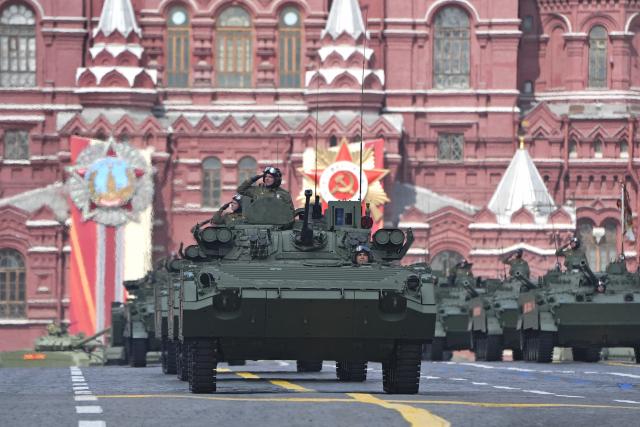 (250509) -- MOSCOW, May 9, 2025 (Xinhua) -- Infantry fighting vehicles march during a grand parade marking the 80th anniversary of the victory in the Soviet Union's Great Patriotic War in Moscow, Russia, May 9, 2025. (Xinhua/Lai Xiangdong)