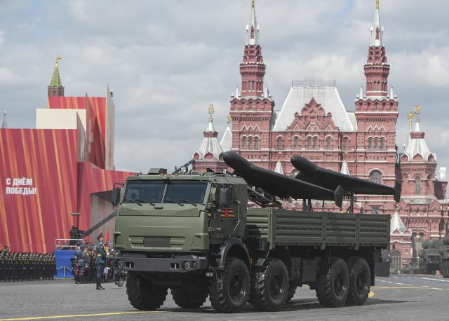 (250509) -- MOSCOW, May 9, 2025 (Xinhua) -- An armored vehicle carrying drones marches during a grand parade marking the 80th anniversary of the victory in the Soviet Union's Great Patriotic War in Moscow, Russia, May 9, 2025. (Xinhua/Lai Xiangdong)