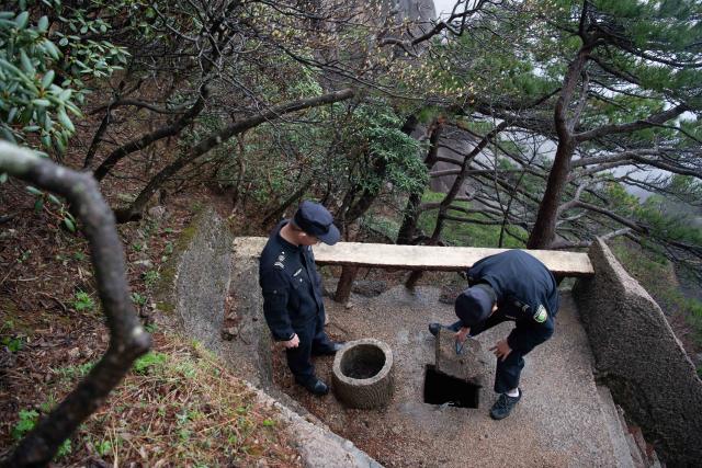 (250509) -- HUANGSHAN, May 9, 2025 (Xinhua) -- Staff members of the parks and woods bureau of Huangshan Scenic Area management committee conduct inspection at Lianhua Peak of Huangshan in east China's Anhui Province, on April 22, 2025. Huangshan Mountain is a listed UNESCO World Cultural and Natural Heritage Site, which has attracted a large number of tourists.
  To minimize the impact of visitors on its vegetation growth, the Huangshan Scenic Area rotates days off for its major scenic spots, as a special arrangement for ecological protection.
   The Tiandu Peak, one of the most popular sites in the Huangshan scenic area, ended its more than five-year "vacation" and resumed opening to the public on May 20, 2024. While the Lianhua Peak, the highest peak of Huangshan Mountain, has been so far closed for more than a year. (Xinhua/Zhang Duan)