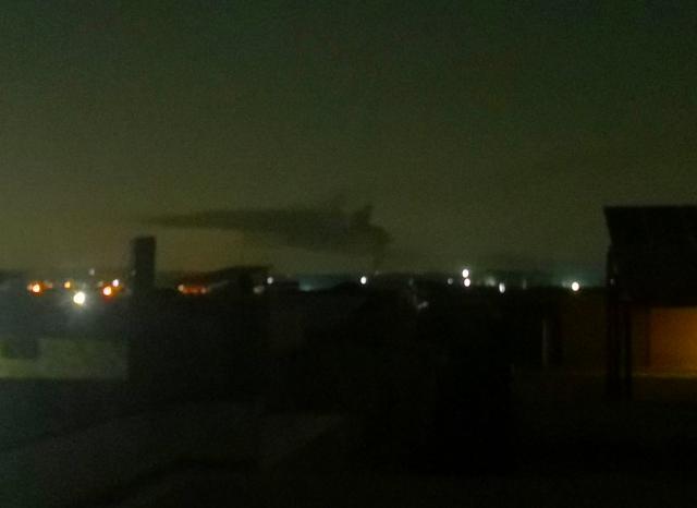 (250509) -- RAWALPINDI, May 10, 2025 (Xinhua) -- Photo taken with a mobile phone shows a smoke cloud near the explosion site in Rawalpindi, Pakistan, on May 10, 2025. A couple of blasts were heard early Saturday in Pakistan's garrison city of eastern Punjab province near the capital Islamabad. (Xinhua/Jamil Bhatti)
