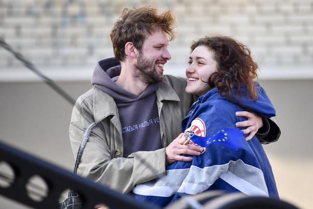 (250510) -- NARVA, May 10, 2025 (Xinhua) -- A couple watches a concert during a Europe Day celebration event in Narva, Estonia, May 9, 2025. (Photo by Sergei Stepanov/Xinhua)