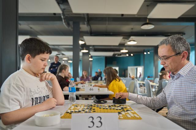 (250510) -- VLADIVOSTOK, May 10, 2025 (Xinhua) -- Players compete during the 4th Far East Cup Go Tournament at Vladivostok, Russia, May 10, 2025. (Photo by Guo Feizhou/Xinhua)