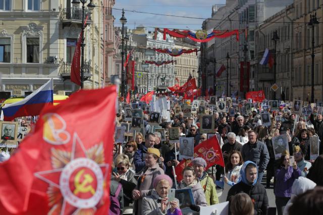 (250510) -- ST. PETERSBURG, May 10, 2025 (Xinhua) -- People participate in the "Immortal Regiment" parade with photos of veterans in hands to commemorate the 80th anniversary of the victory in the Soviet Union's Great Patriotic War in St. Petersburg, Russia, May 9, 2025. (Photo by Irina Motina/Xinhua)